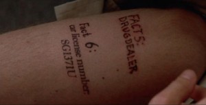 Figure 1: Throughout the movie, the protagonist repeatedly "discovers" that his body is covered in tattoos like this, and thus repeatedly is reminded of what he's learned so far in his pursuit of his wife's murderer.